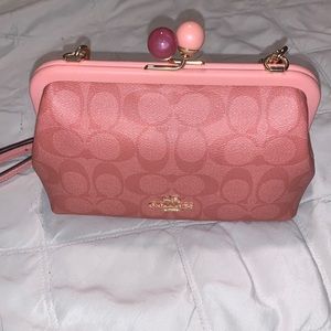Cute small pink coach shoulder bag with matching coin purse wallet